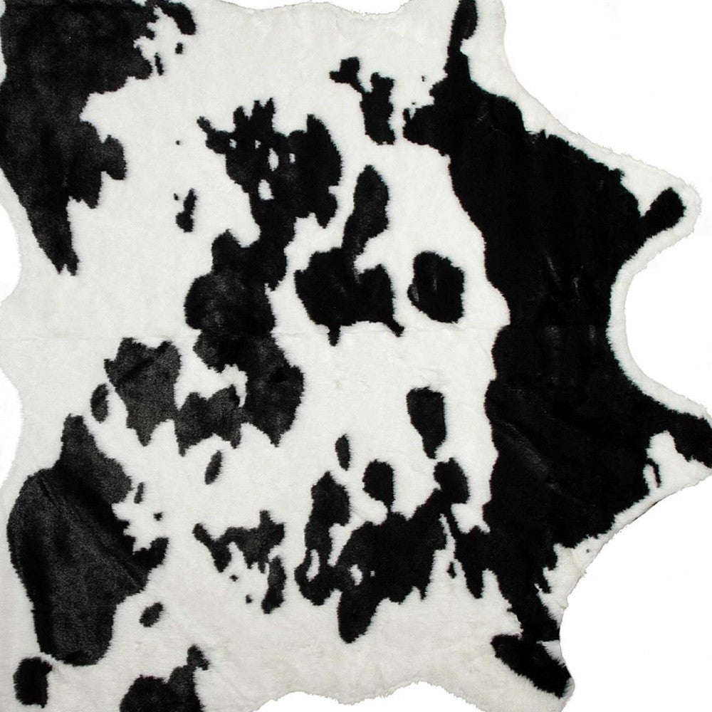 4' x 5' Black and White Faux Cowhide Animal Print Area Rug