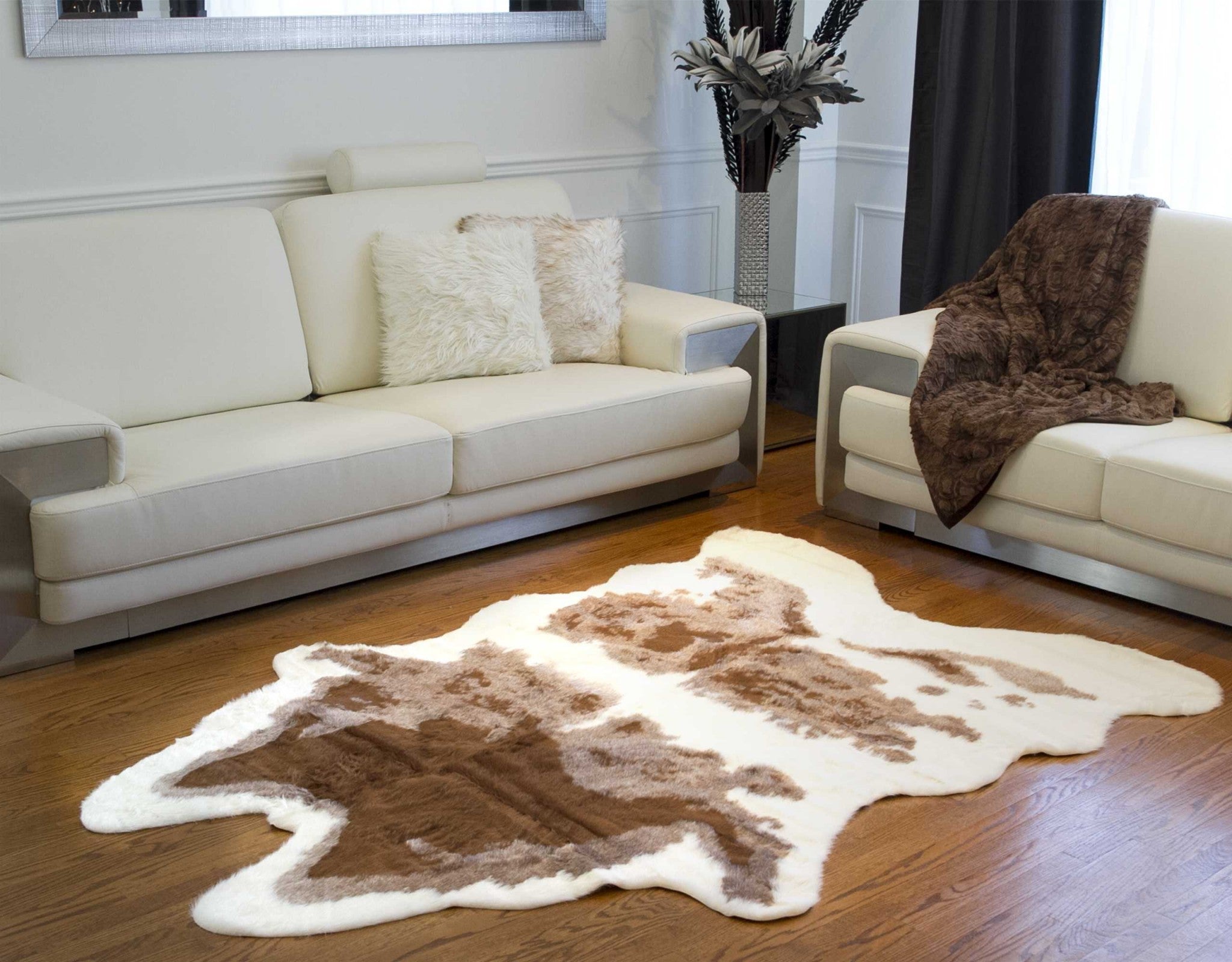 4' x 5' Brown and Ivory Faux Cowhide Animal Print Printed Area Rug