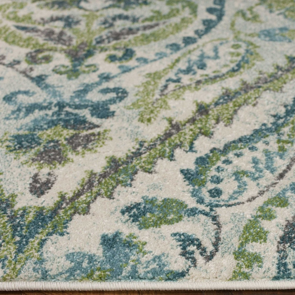 7' X 10'  Polypropylene Ivory Or Teal Area Rug