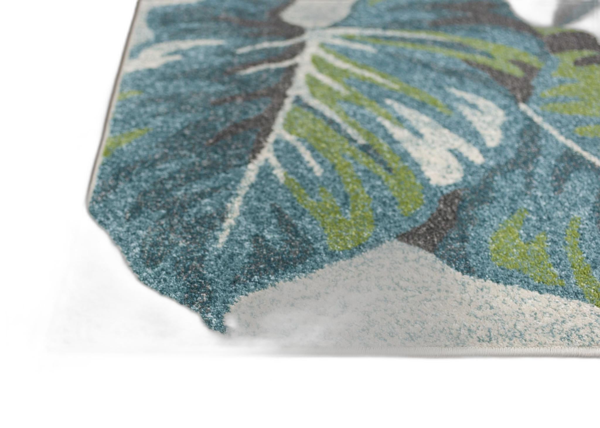 5' X 8' Teal Or Green Tropical Leaves Indoor Area Rug