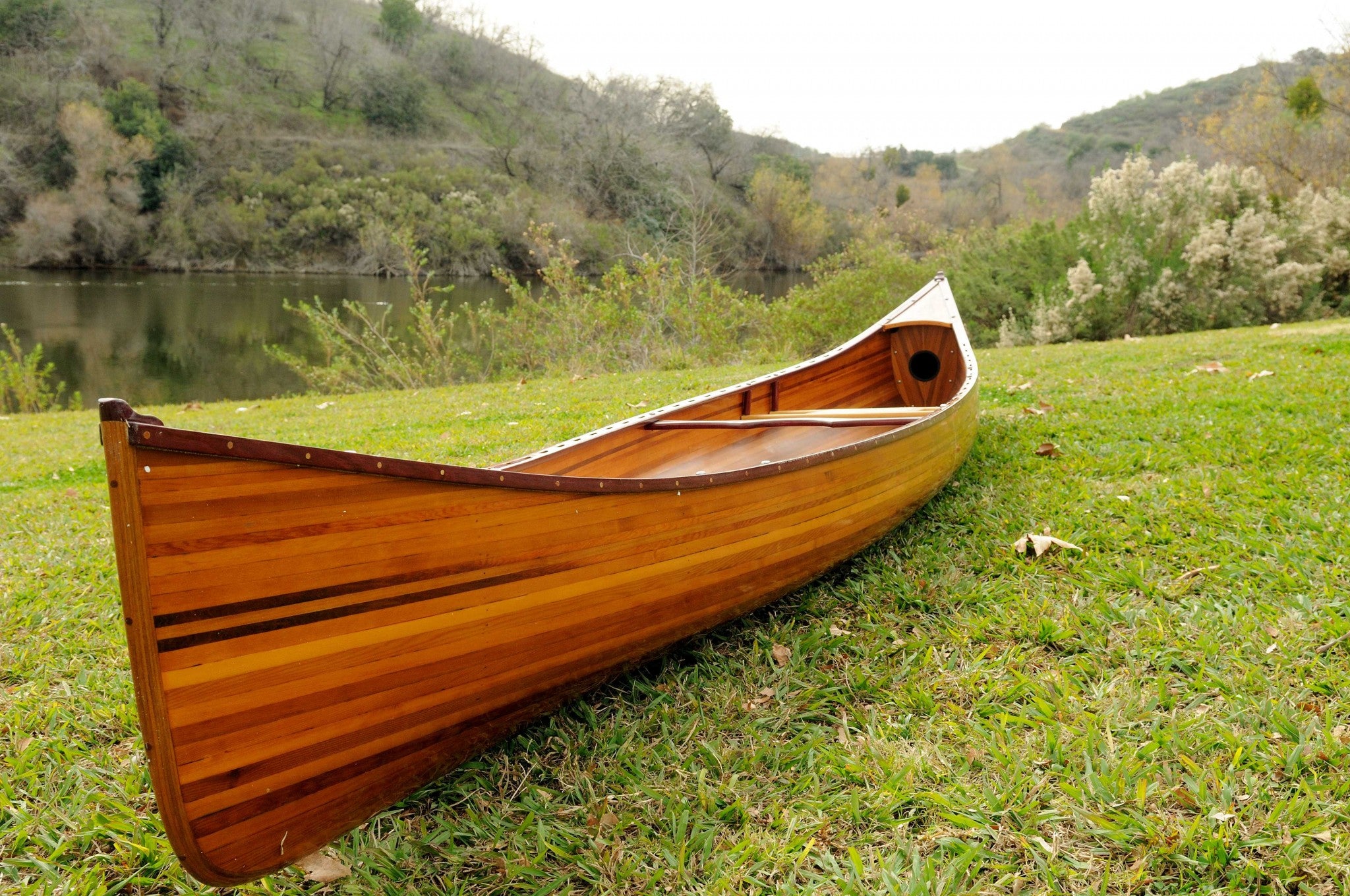35.5" X 216" X 27" Wooden Canoe