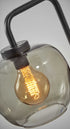 Smoked Glass Globe Shade With Vintage Edison Bulb And Matte Black Metal Arc Table Lamp