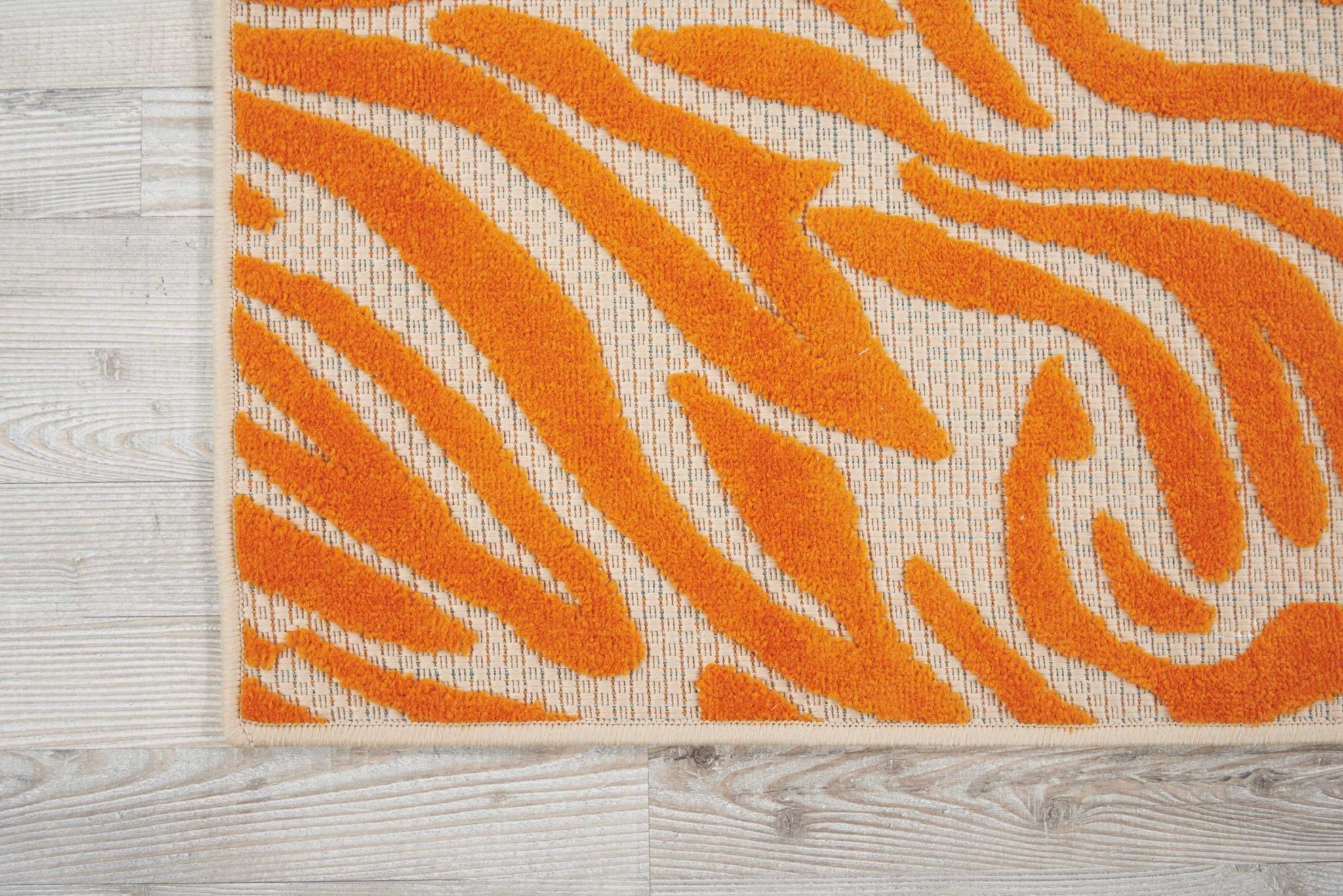 4' X 6' Orange And Ivory Abstract Stain Resistant Indoor Outdoor Area Rug