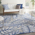 5' X 8' Ivory And Blue Floral Indoor Outdoor Area Rug