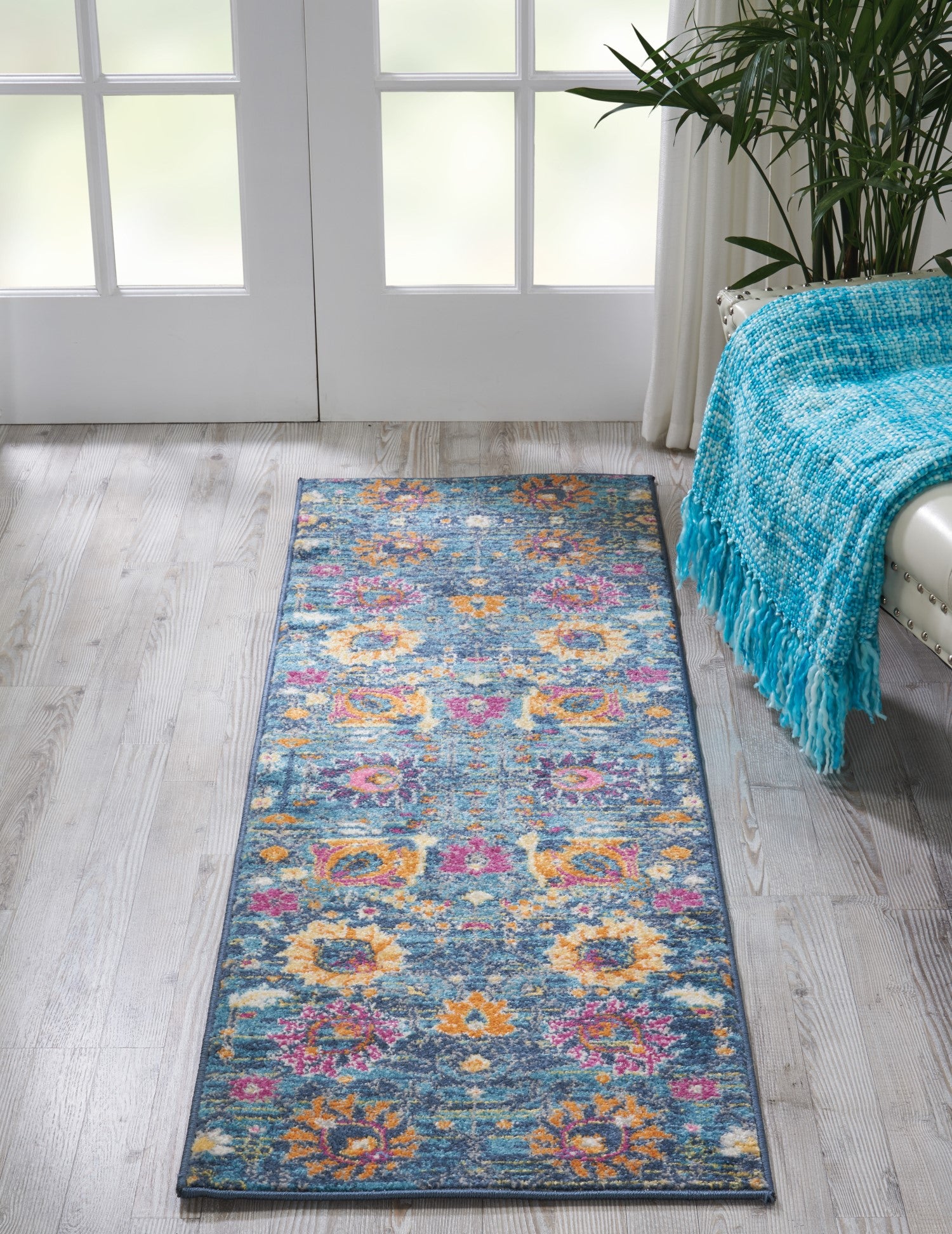 4' Blue And Orange Round Floral Power Loom Area Rug