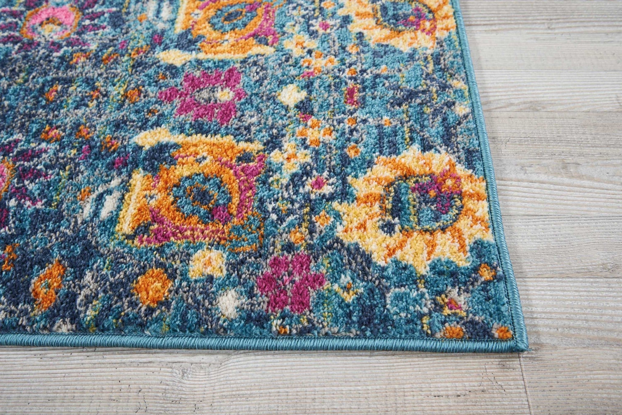 4' Blue And Orange Round Floral Power Loom Area Rug