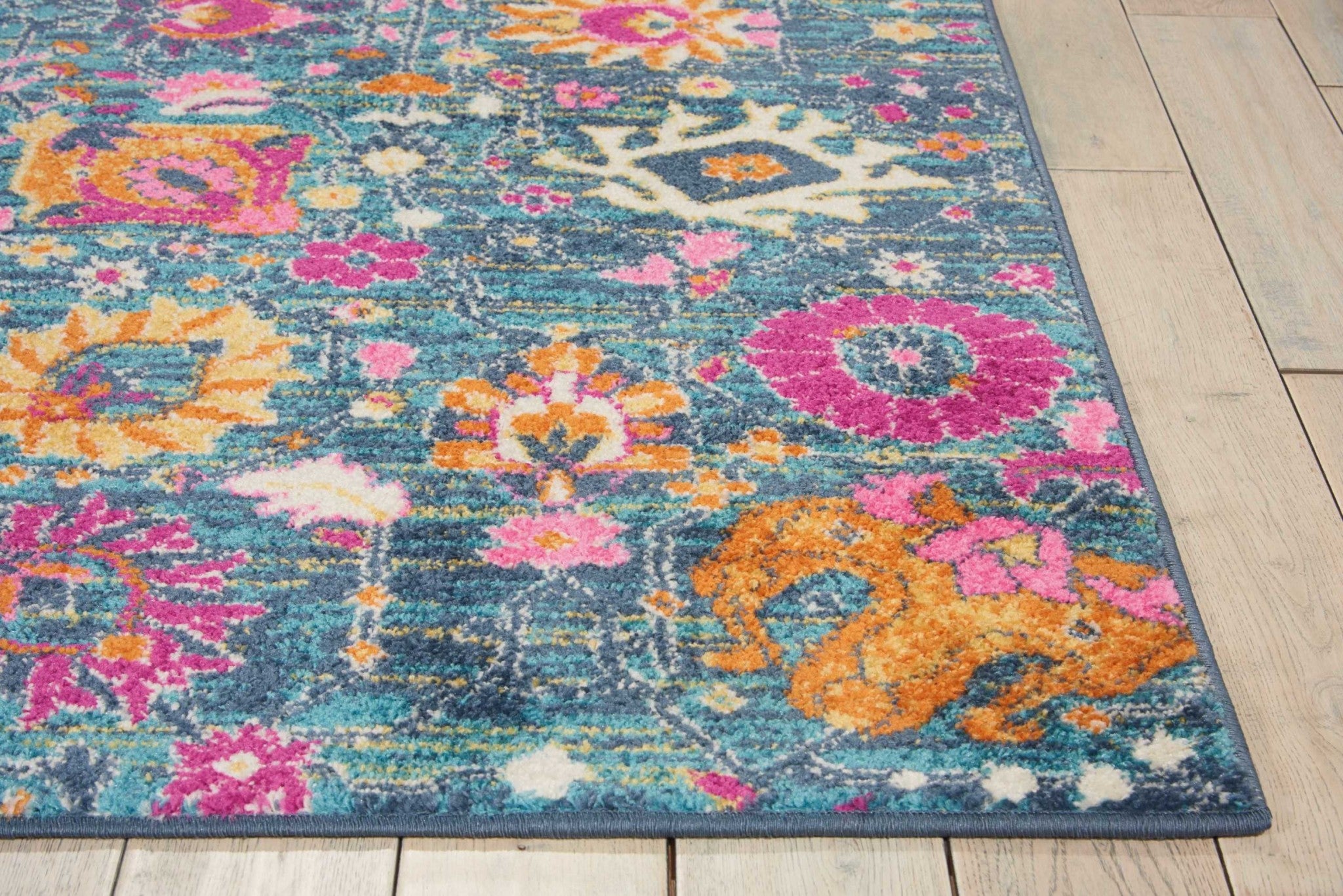 4' Blue And Orange Round Floral Power Loom Area Rug