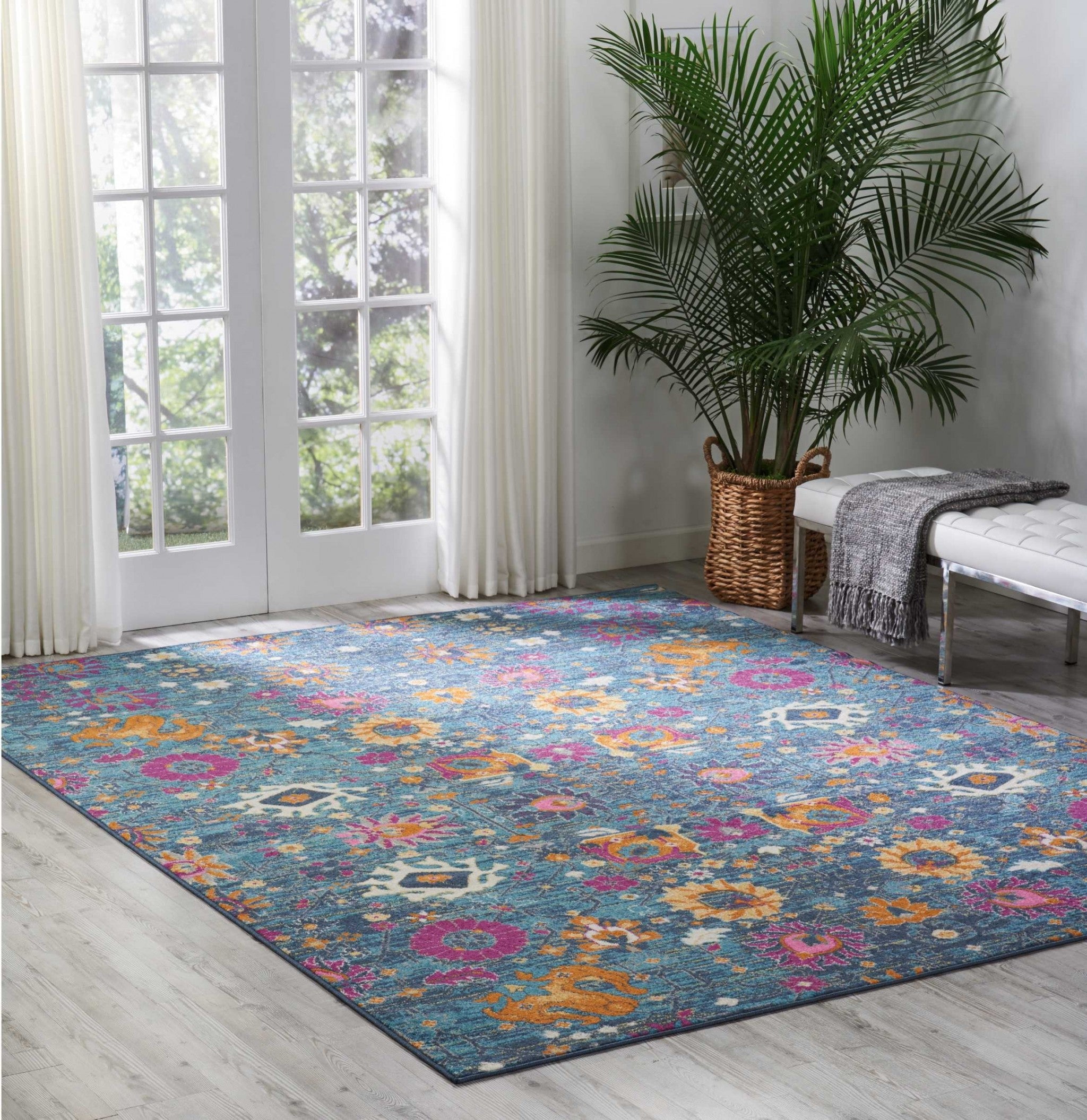 4' Blue And Orange Round Floral Power Loom Area Rug