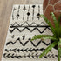 2’ X 8’ Ivory And Black Eclectic Patterns Indoor Runner Rug