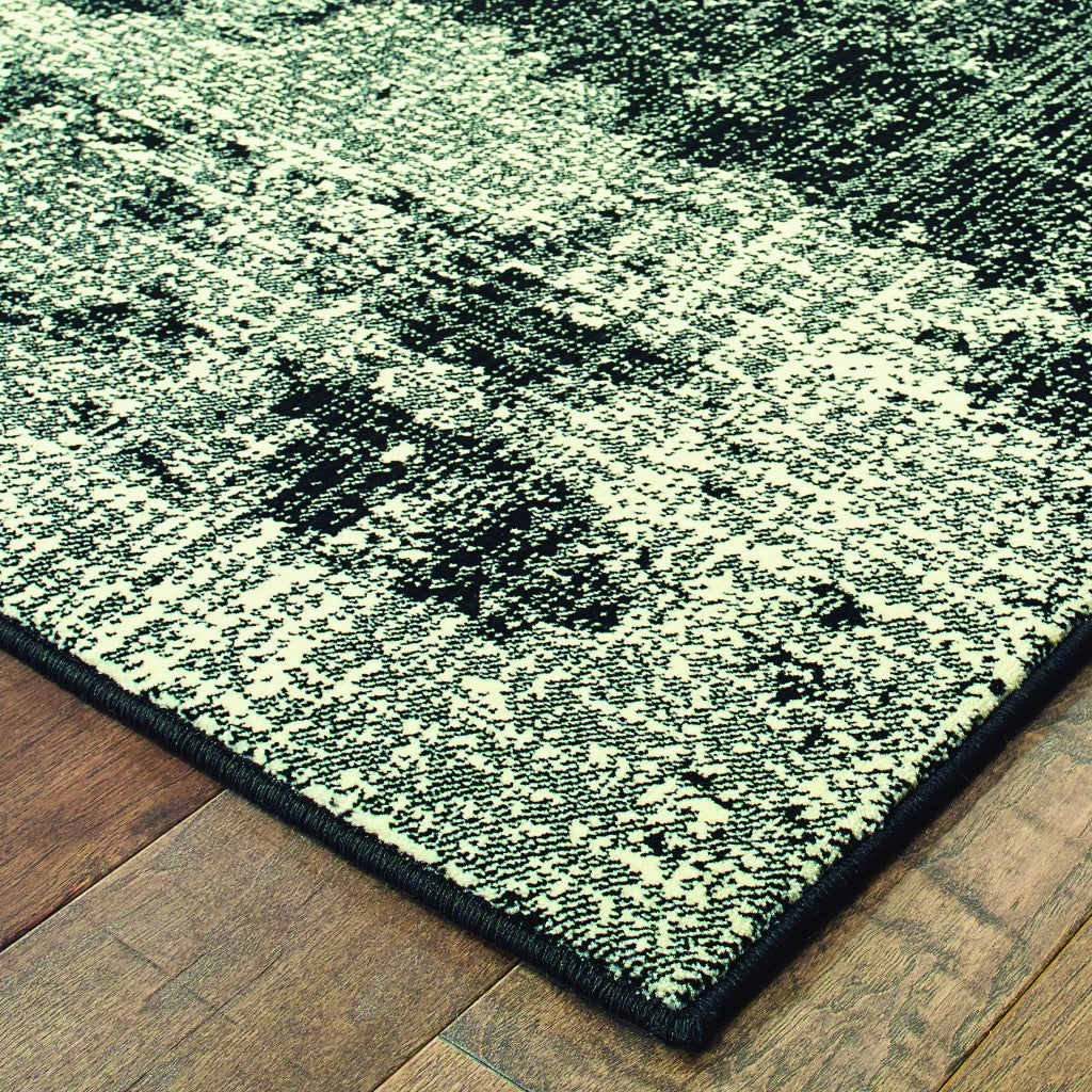 6' X 9' Black Ivory Machine Woven Abstract Indoor Area Rug