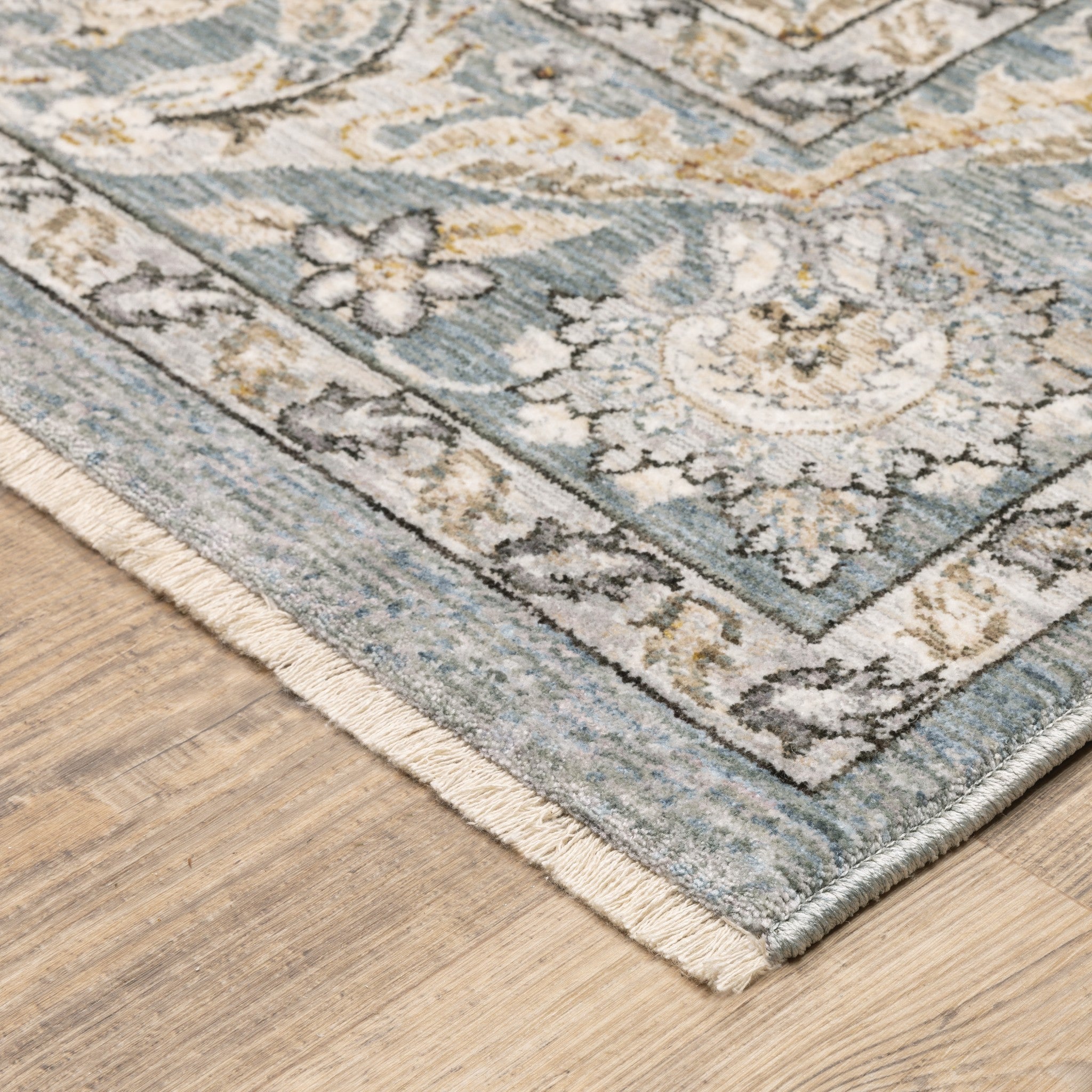 7' X 10' Blue Ivory Machine Woven Floral Oriental Indoor Area Rug