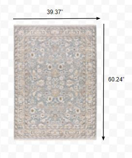 7' X 10' Blue Ivory Machine Woven Floral Oriental Indoor Area Rug