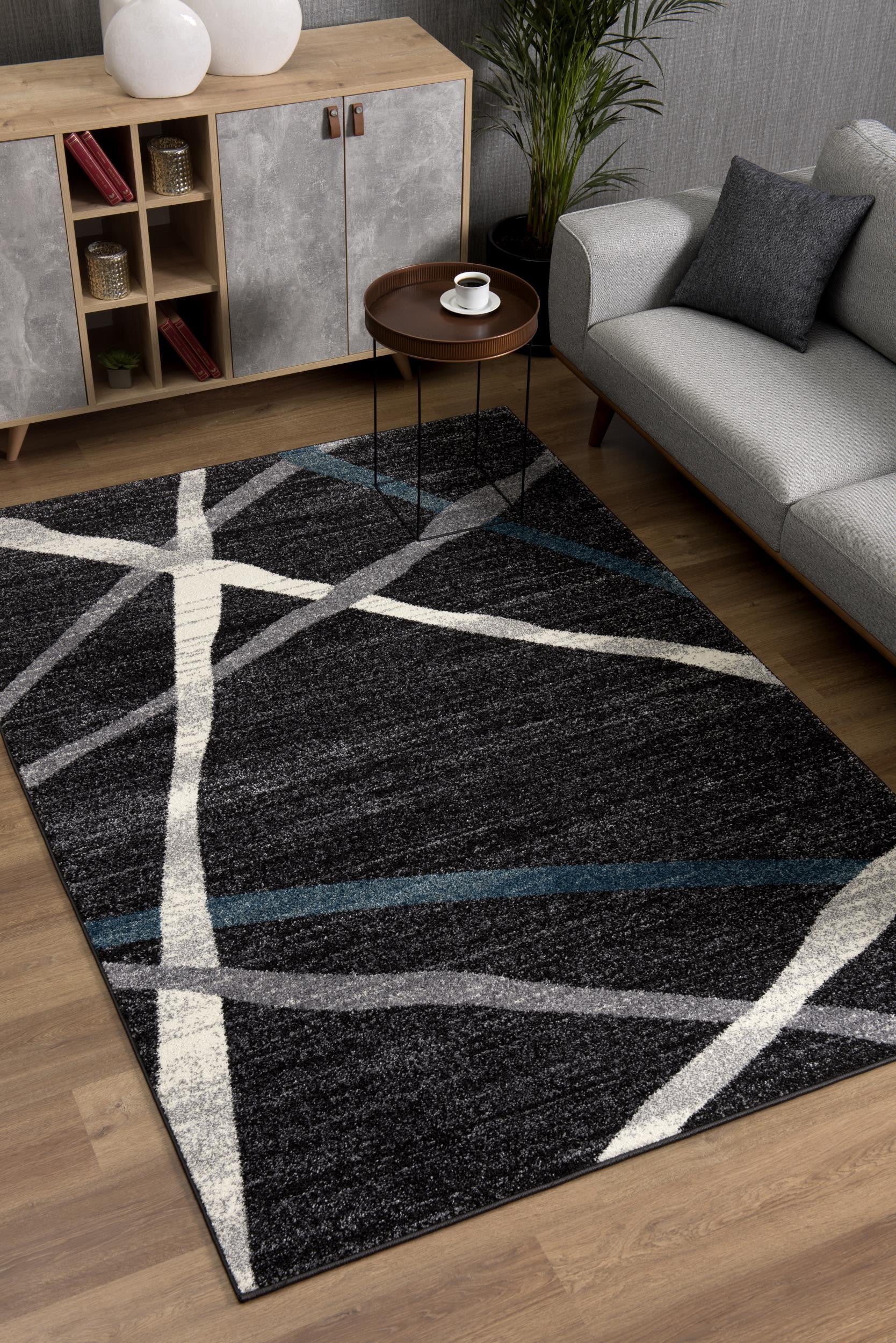 7’ X 9’ Distressed Black And Gray Abstract Area Rug