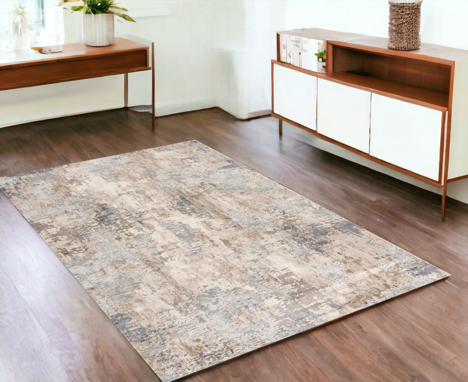 4’ X 6’ Beige And Ivory Abstract Area Rug