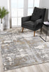 7’ X 10’ Beige And Gray Distressed Area Rug