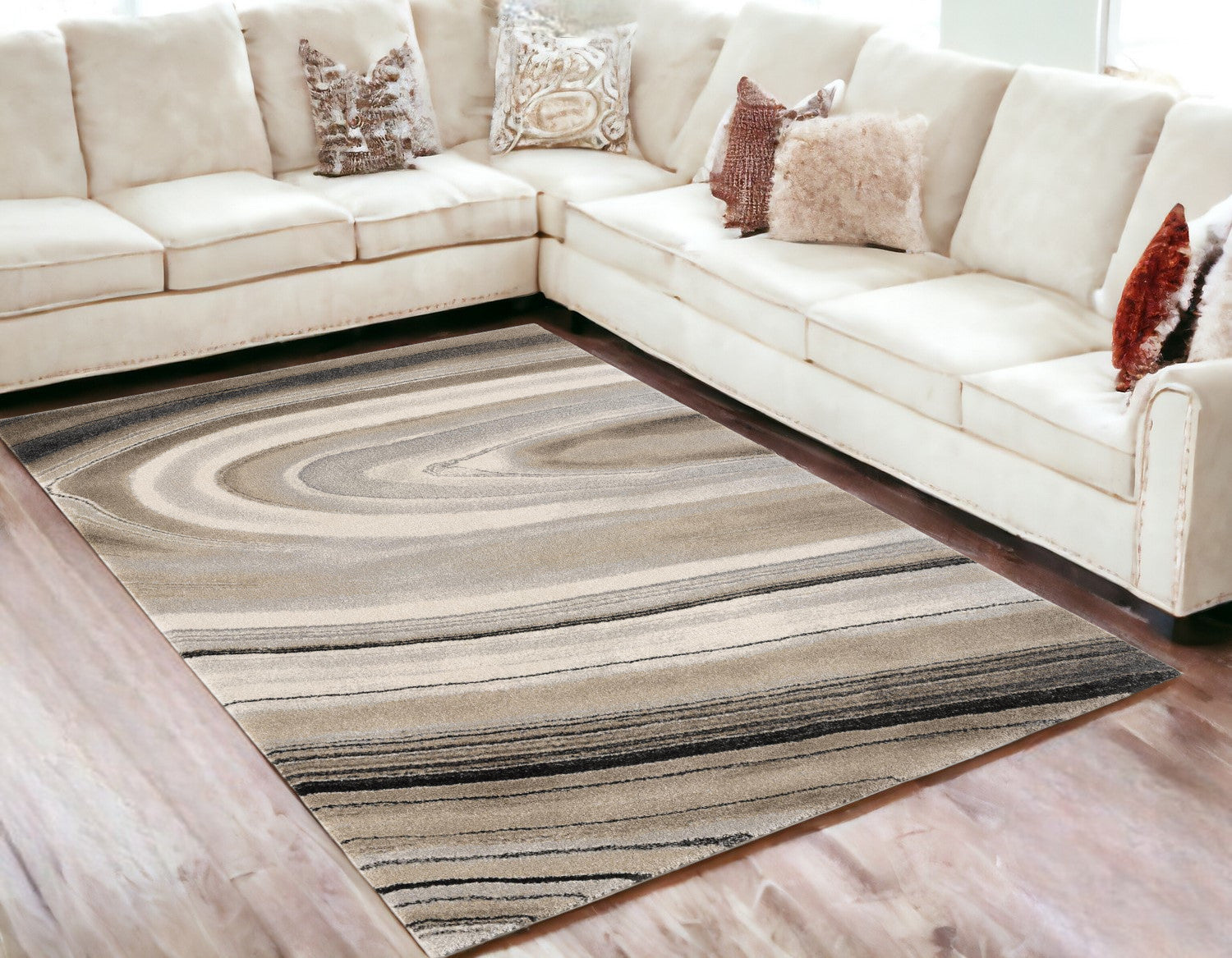 7’ x 10’ Cream and Tan Abstract Marble Area Rug