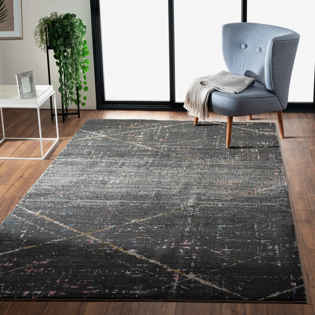 5’ x 8’ Distressed Black Abstract Area Rug