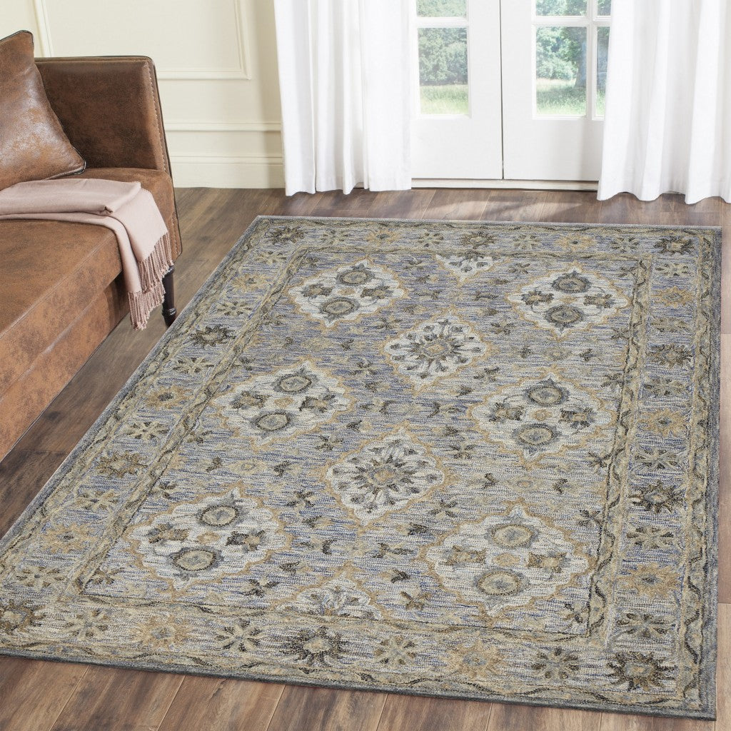 8’ x 10’ Blue and Tan Traditional Area Rug