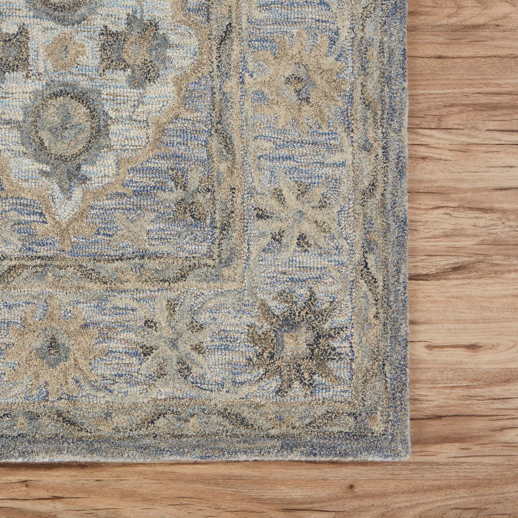 8’ x 10’ Blue and Tan Traditional Area Rug