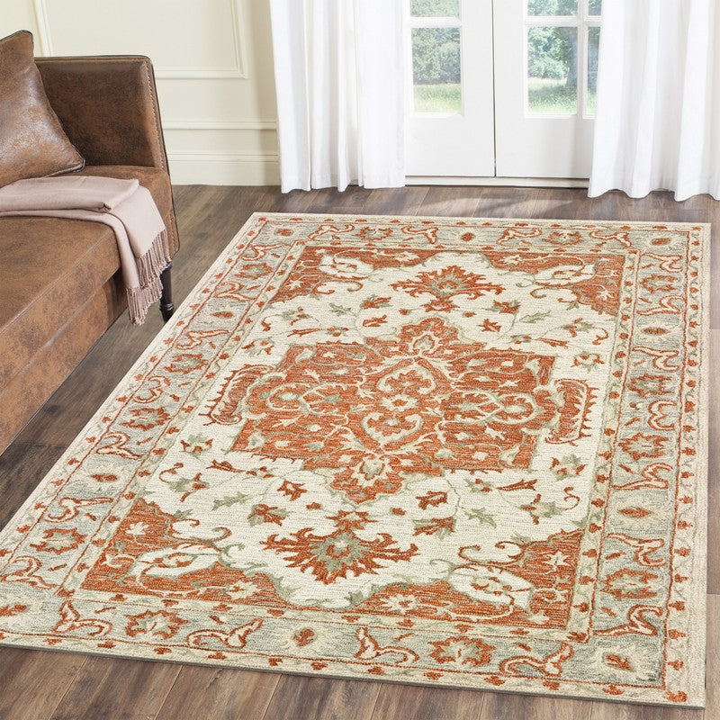 5’ x 8’ Orange and Ivory Medallion Area Rug