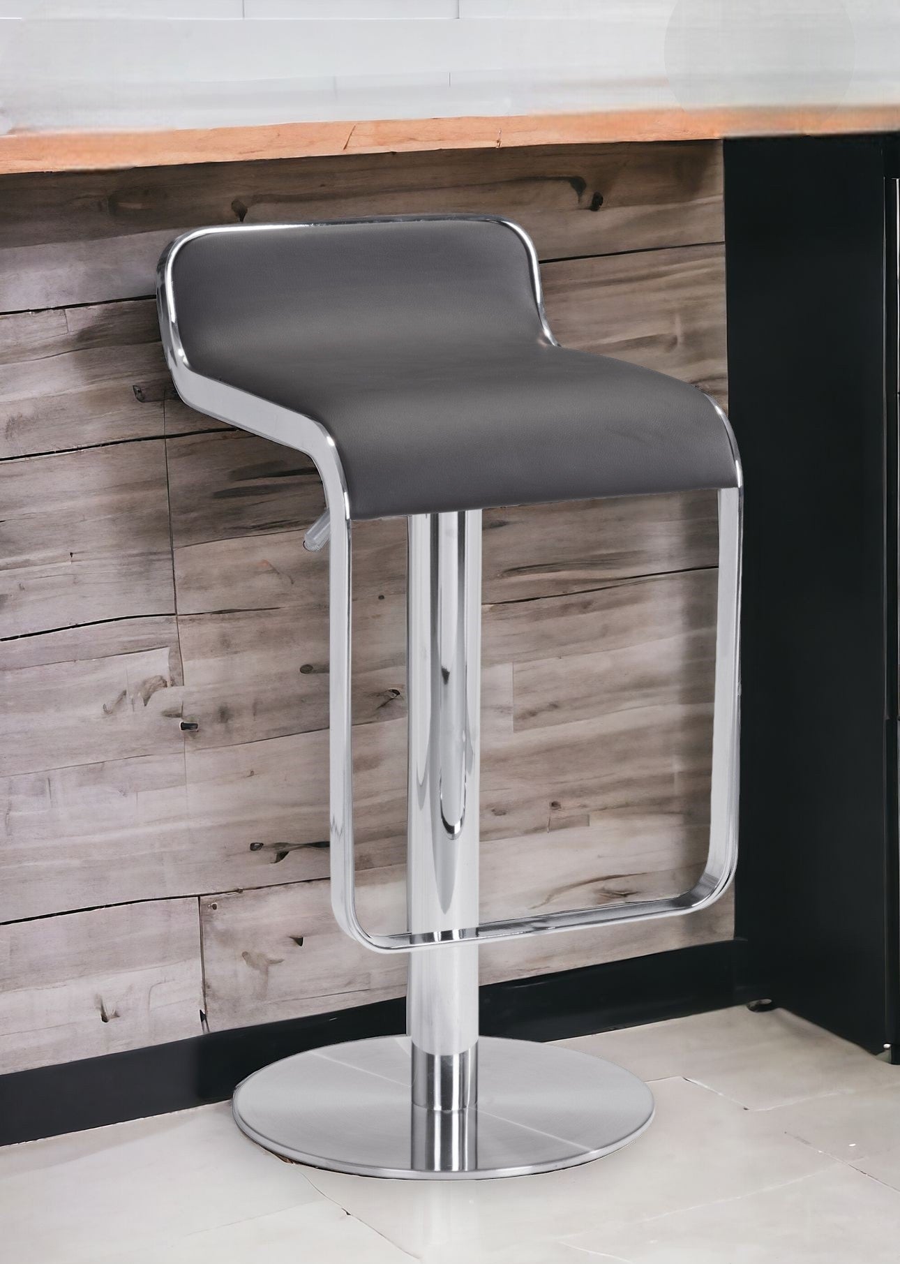 27" Black And Silver Steel Swivel Backless Adjustable Height Bar Chair