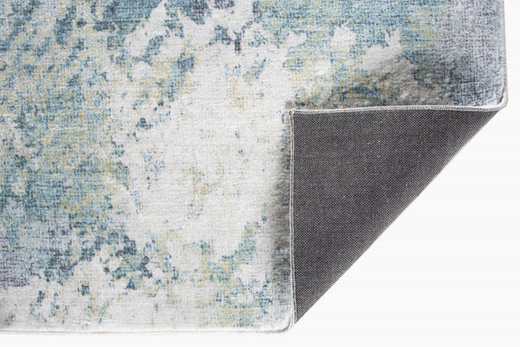 5' X 8' Blue And Ivory Abstract Dhurrie Area Rug