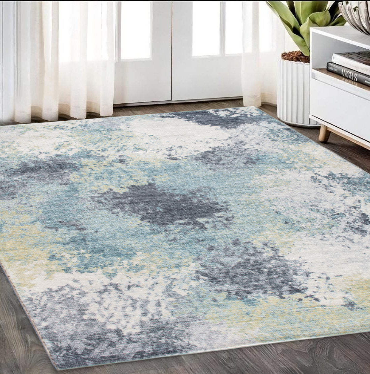 5' X 8' Blue And Ivory Abstract Dhurrie Area Rug