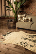 5' X 8' Off White Black and Gold Faux Cowhide Washable Area Rug