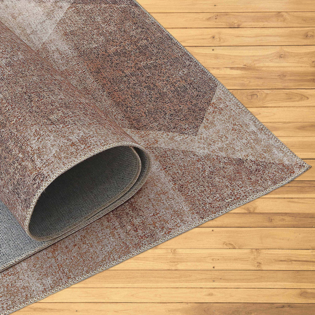 5' X 8' Brown Geometric Stain Resistant Area Rug