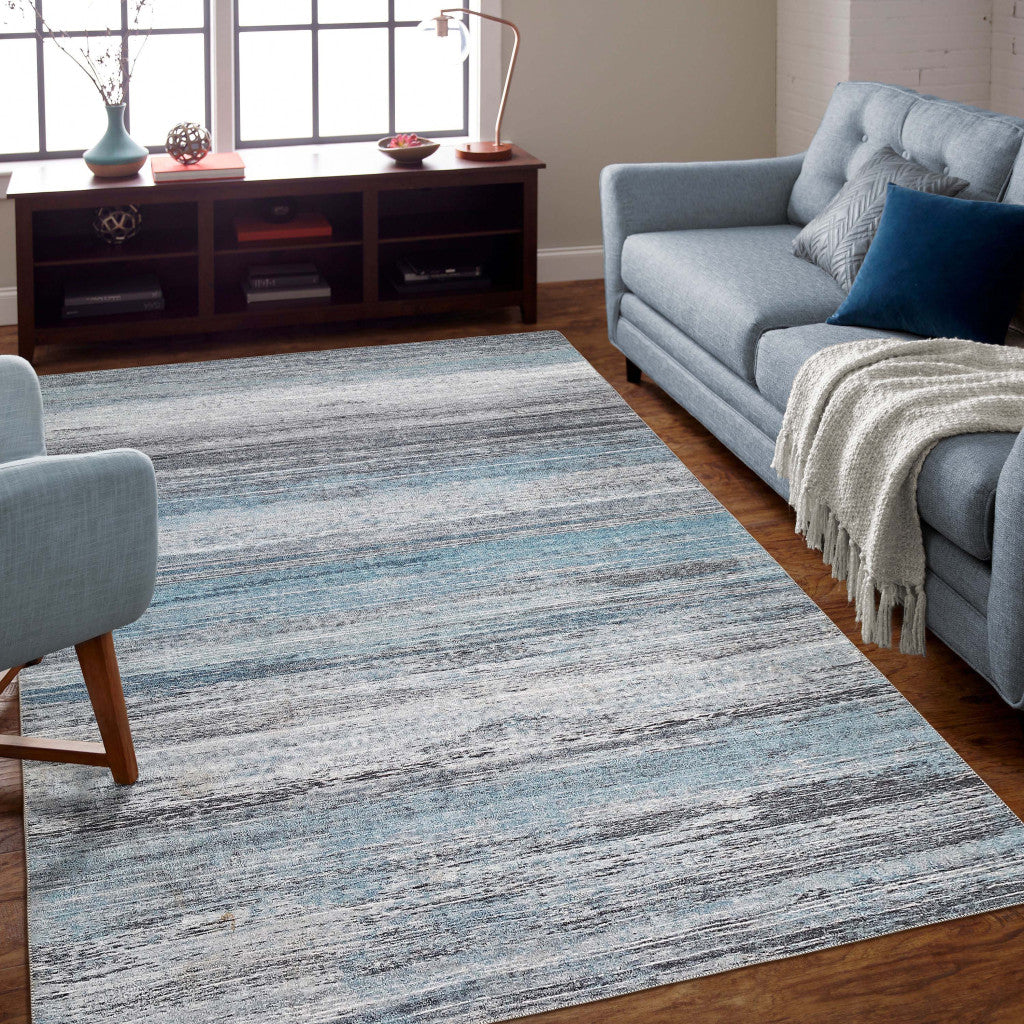 4' X 6' Turquoise and Gray Abstract Stain Resistant Area Rug