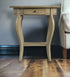 26" Beige Manufactured Wood Oval End Table With Drawer And Shelf