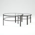 Set of Two 36" Clear And Black Glass And Steel Round Nested Coffee Tables