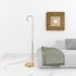 62" Brass Arched Floor Lamp With White Frosted Glass Cone Shade