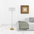 61" Brass Two Light Floor Lamp With White Frosted Glass Drum Shade