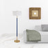 61" Brass Two Light Floor Lamp With White Frosted Glass Drum Shade