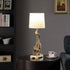 24" Gold Monkey Table Lamp With White Drum Shade