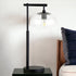 25" Black Metal Arched Table Lamp With Clear Seeded Globe Shade