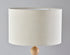 28" Brown Solid Wood Candlestick Table Lamp With Off White Drum Shade