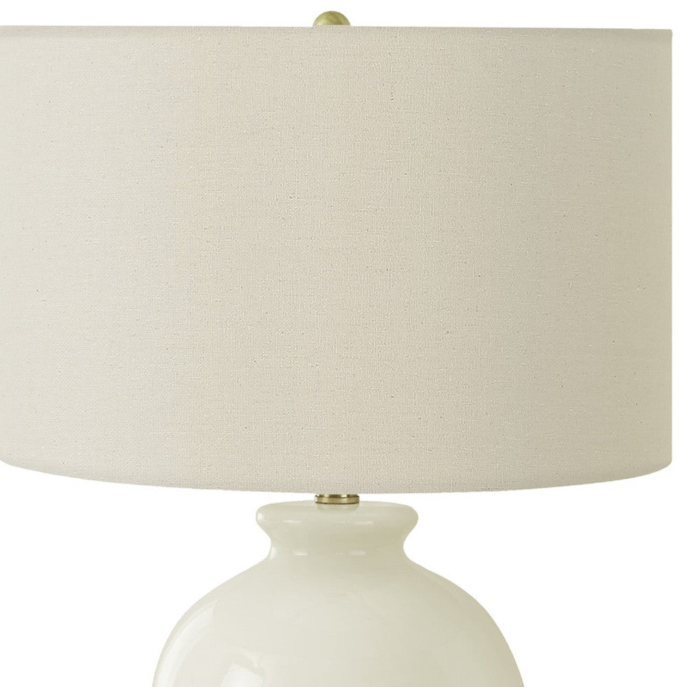 26" Gold and Ivory Ceramic Urn Table Lamp With Cream Drum Shade