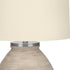 25" Cream Concrete Round Table Lamp With Beige Drum Shade